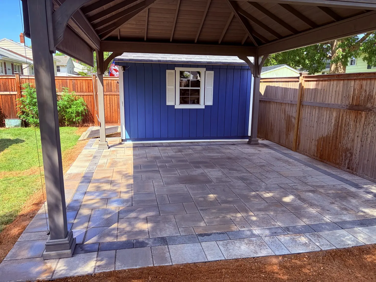 Completed backyard paver patio with pavilion in Hamilton, New Jersey